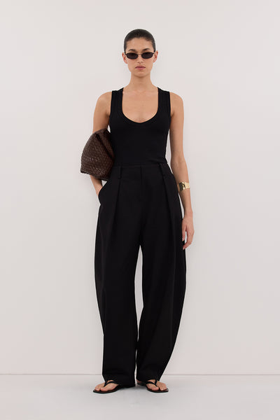 Aude wearing YASMIN BLACK SLEEVELESS KNIT TANK