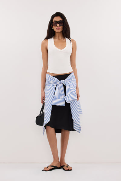 Anaya wearing YASMIN OFF WHITE SLEEVELESS KNIT TANK