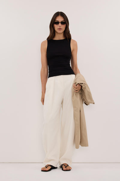Helena  wearing AMARA BLACK BOAT NECK KNIT TANK
