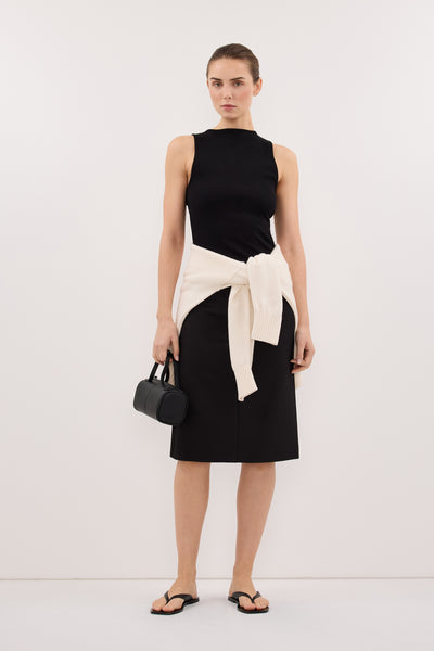 Stas wearing AMARA BLACK BOAT NECK KNIT TANK