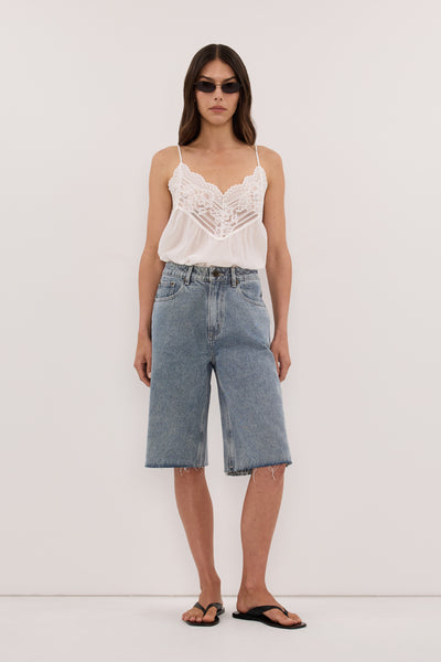 Helena  wearing REAGAN LIGHT BLUE DENIM BERMUDA SHORT