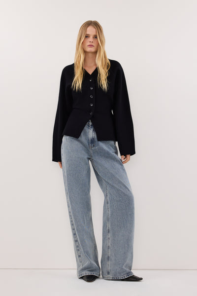 Zoe wearing REAGAN 2.0 LIGHT BLUE TALL SLOUCHY JEAN