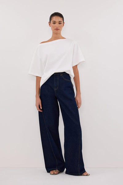 Stas wearing CARSON INDIGO TALL WIDE LEG JEAN