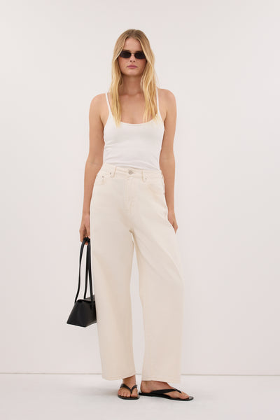 Zoe wearing FRANK CREAM RELAXED BARREL JEAN