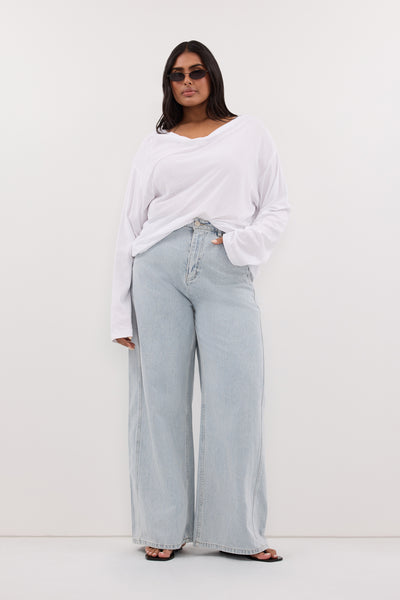 Shanaya wearing DREW LIGHT RINSE WIDE LEG DENIM JEAN