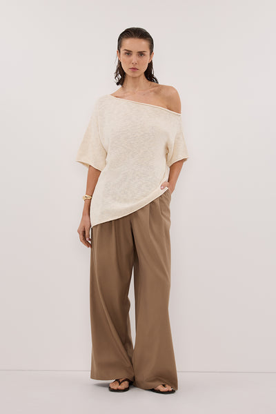 Stas wearing RICK CREAM ASYM KNIT TOP