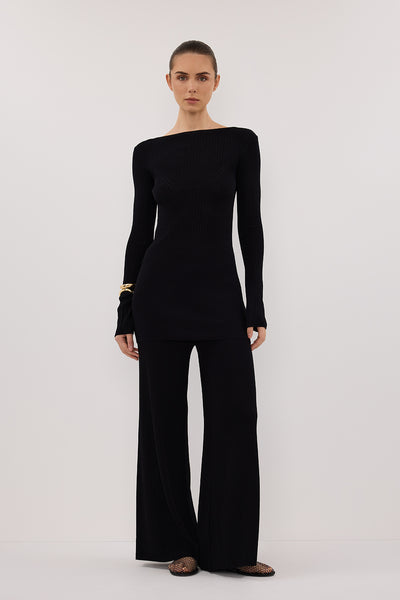 Stas wearing JOY BLACK LONGLINE KNIT TOP