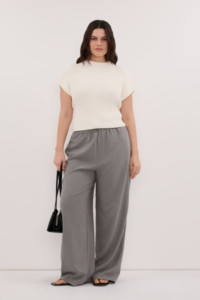 Jasmine wearing DELLA OFF WHITE KNIT TOP