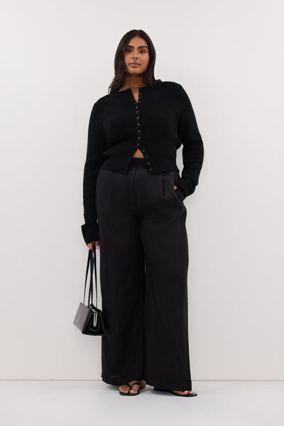 Zoe wearing IRIS BLACK CREW KNIT CARDIGAN
