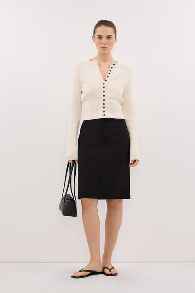 Stas wearing IRIS IVORY CREW KNIT CARDIGAN