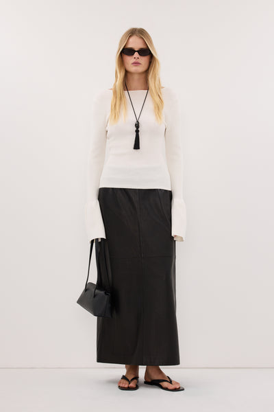 Zoe wearing VARA OFF WHITE LONG SLEEVE KNIT TOP