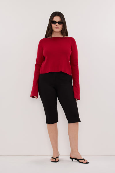 Jasmine wearing ILLARIA BURNT RED WIDE SLEEVE KNIT TOP