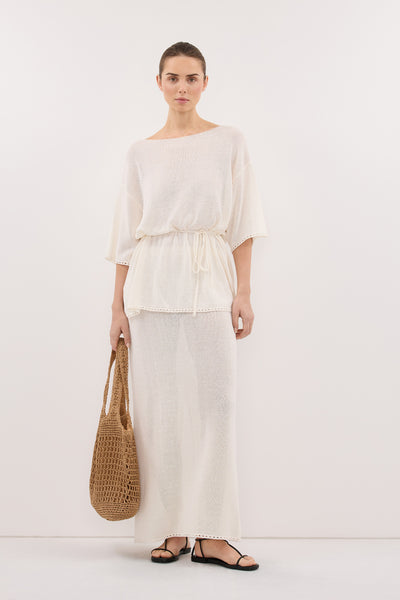 Stas wearing TARI OFF WHITE KNIT MIDI SKIRT