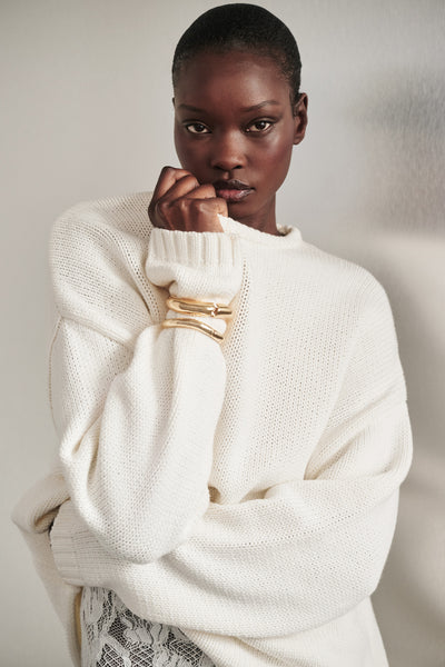 Ayen wearing BRYANNA IVORY LONGLINE KNIT JUMPER