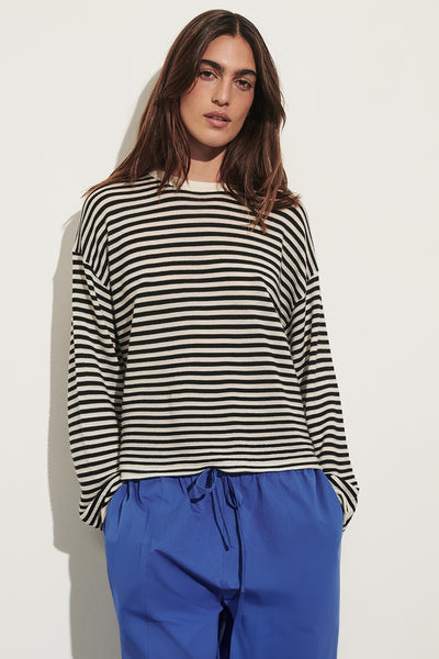Sofia wearing POSIE BLACK STRIPE MERINO KNIT TOP