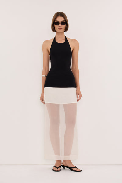 Lilly wearing NYRA BLACK LONGLINE HALTER TOP