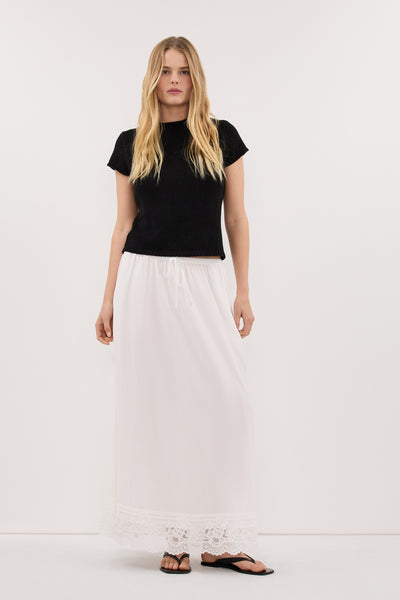 Zoe wearing LEO BLACK KNIT TOP