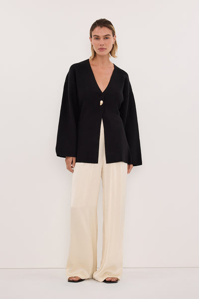 Joanna wearing SCOUT BLACK LONG SLEEVE KNIT TOP