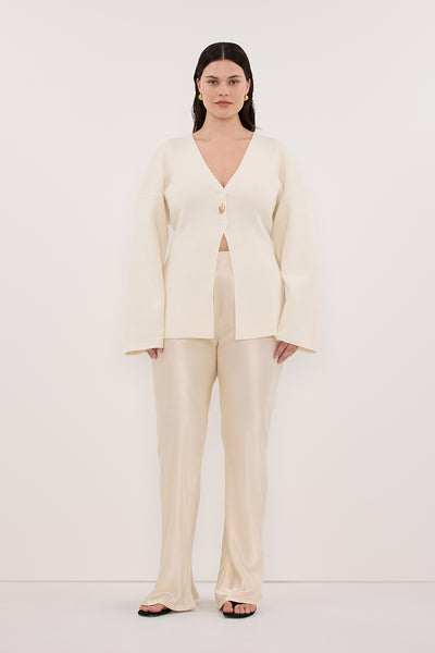 Jasmine wearing SCOUT CREAM LONG SLEEVE KNIT TOP