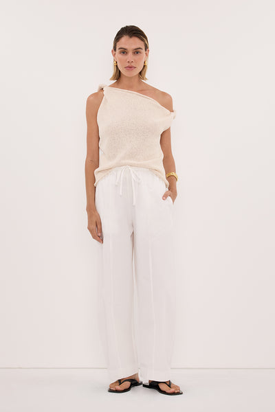 Joanna wearing KARA SANDSTONE ASYM KNIT TOP