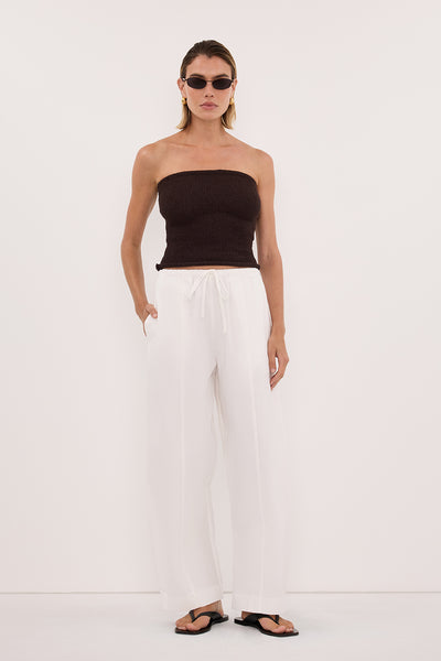 Joanna wearing KARA CHOC STRAPLESS BANDEAU KNIT TOP