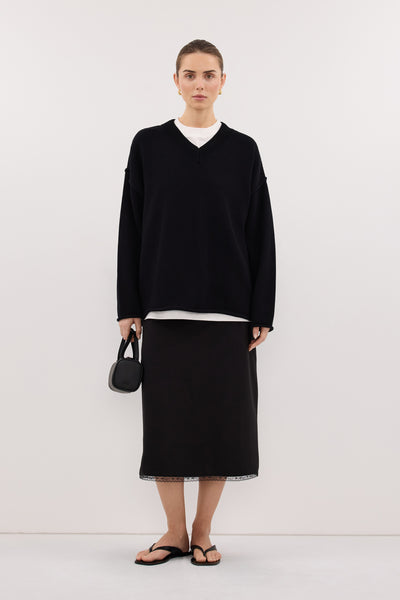 Stas wearing FLINT BLACK V NECK KNIT JUMPER