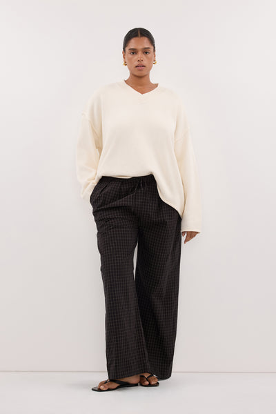 Amanda wearing FLINT CREAM V NECK KNIT JUMPER