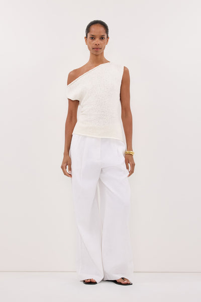 Kristen wearing DINA OFF WHITE COTTON ASYM KNIT TOP
