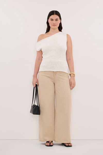 Jasmine wearing DINA OFF WHITE COTTON ASYM KNIT TOP