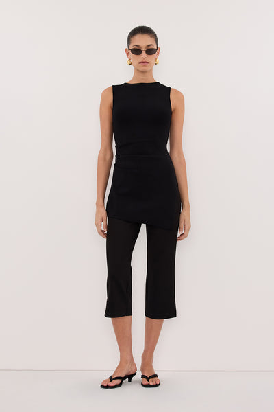 Aude wearing CLEO BLACK SLEEVELESS LONGLINE KNIT TOP 