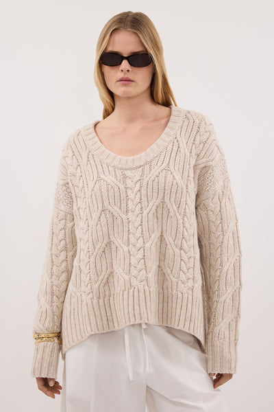 Zoe wearing ROSE CHALK CABLE KNIT SWEATER