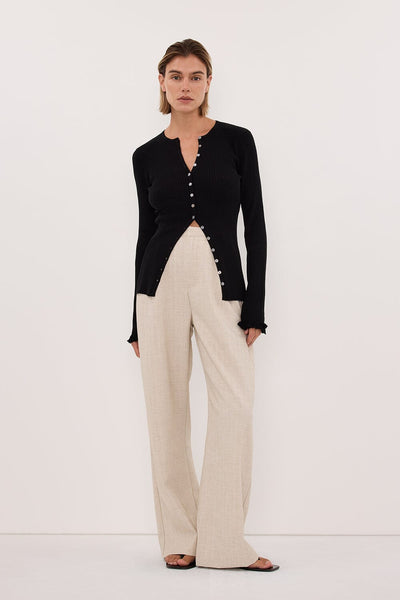 Joanna wearing KAIA BLACK RUFFLE KNIT CARDIGAN