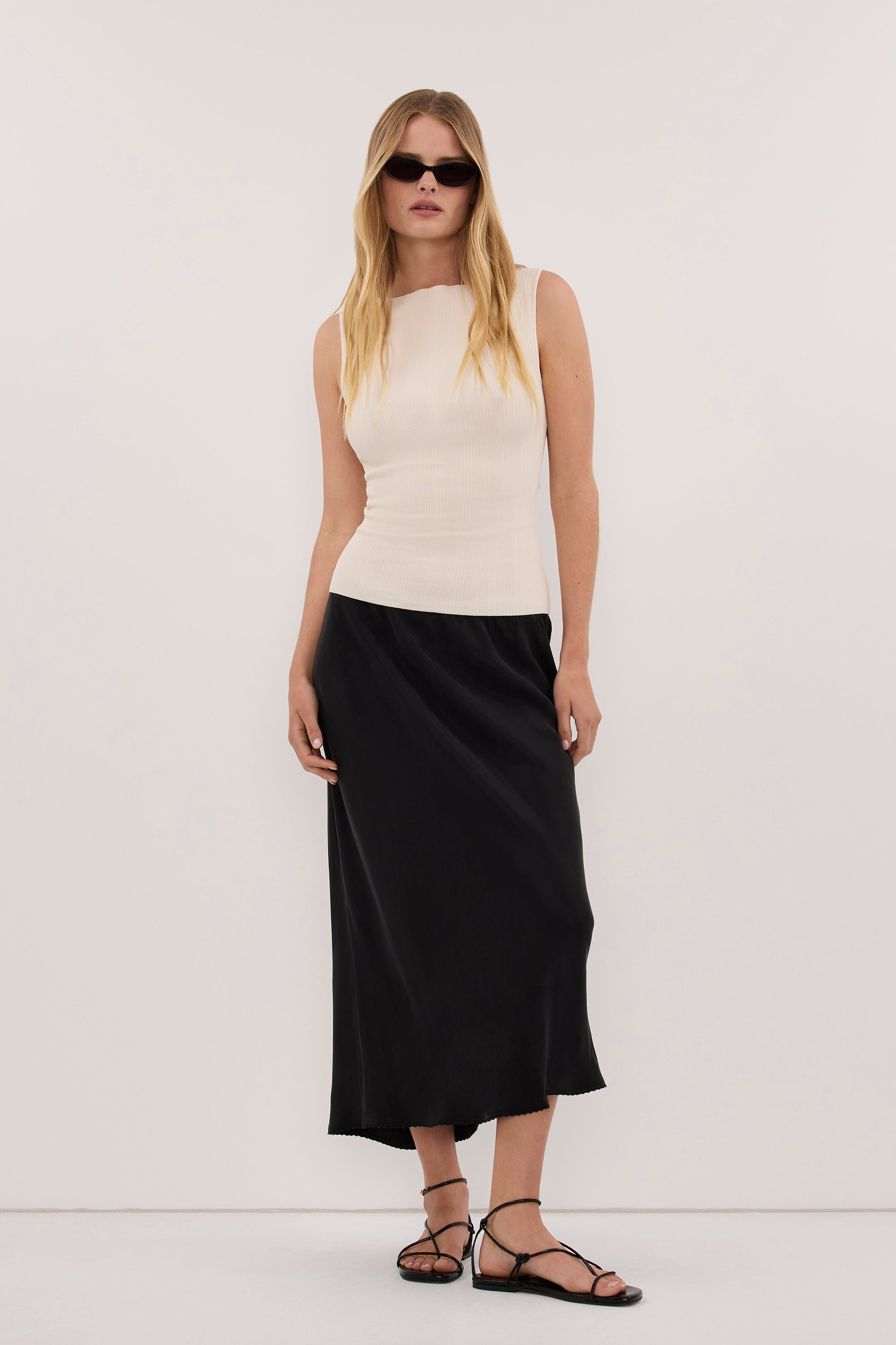 DOVE MILK SLEEVELESS RIBBED KNIT TANK