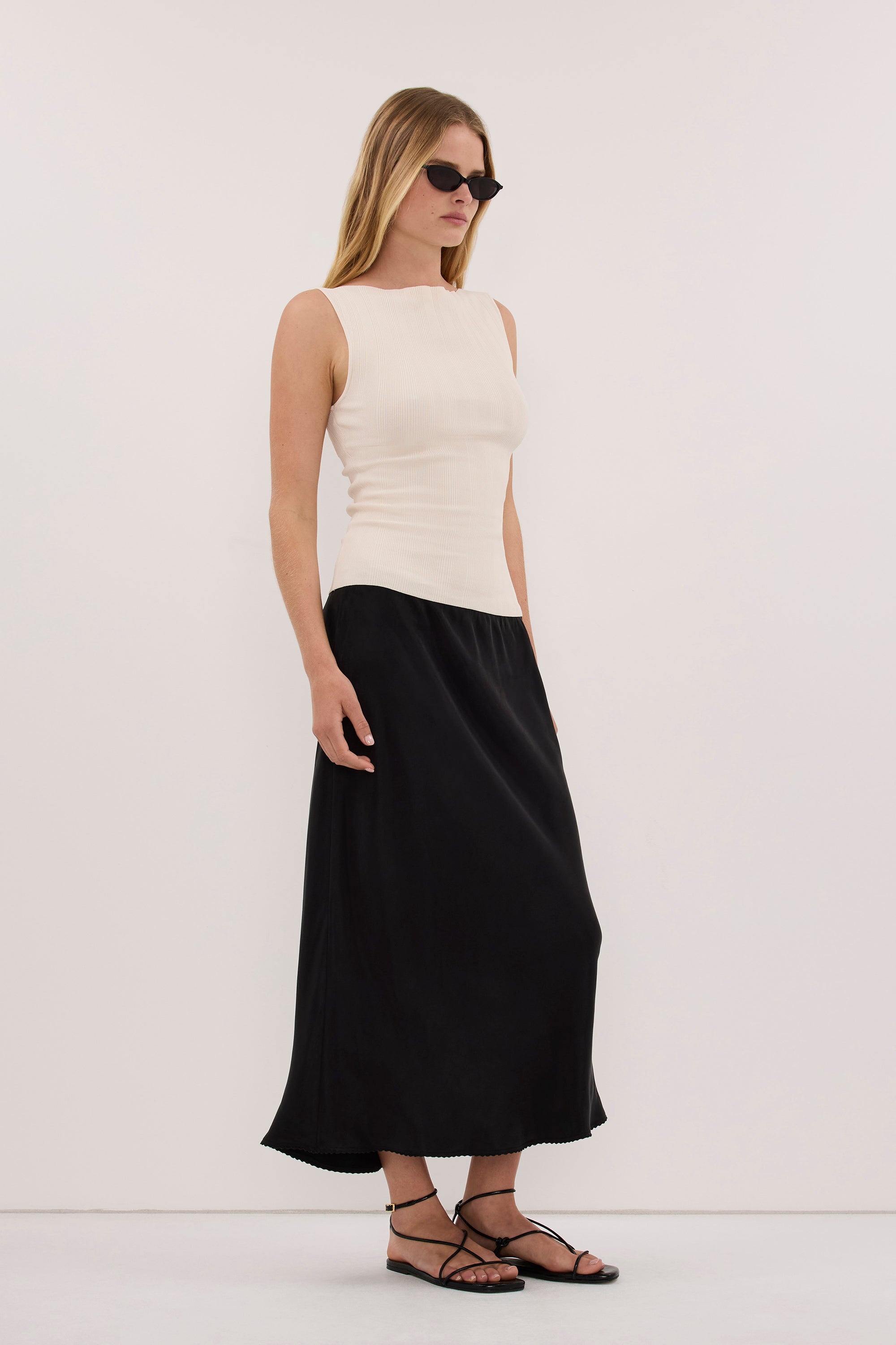 DOVE MILK SLEEVELESS RIBBED KNIT TANK
