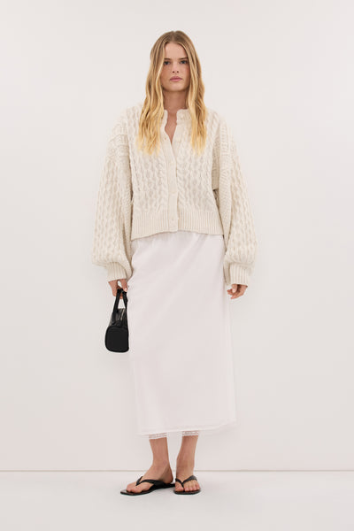 Zoe wearing CARMEN IVORY CABLE KNIT CARDIGAN
