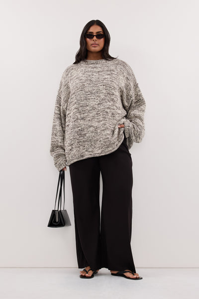 Shanaya wearing JETT CHOC MARLE LONGLINE KNIT JUMPER