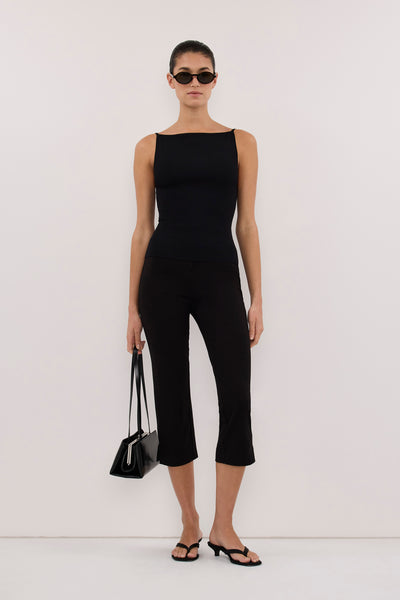 Aude wearing VIREYA BLACK BOAT NECK KNIT TOP