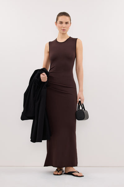 Stas wearing RILYNN CHOC SLEEVELESS MAXI DRESS